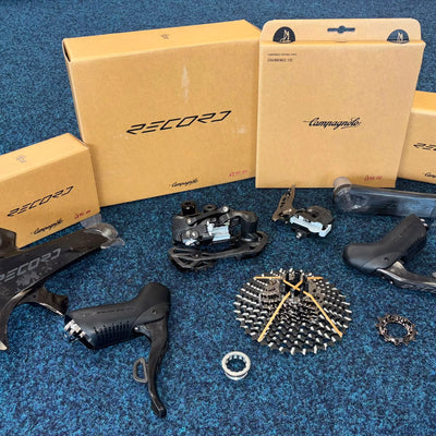 Complete Campagnolo Record 13 speed groupset laid out with original boxes