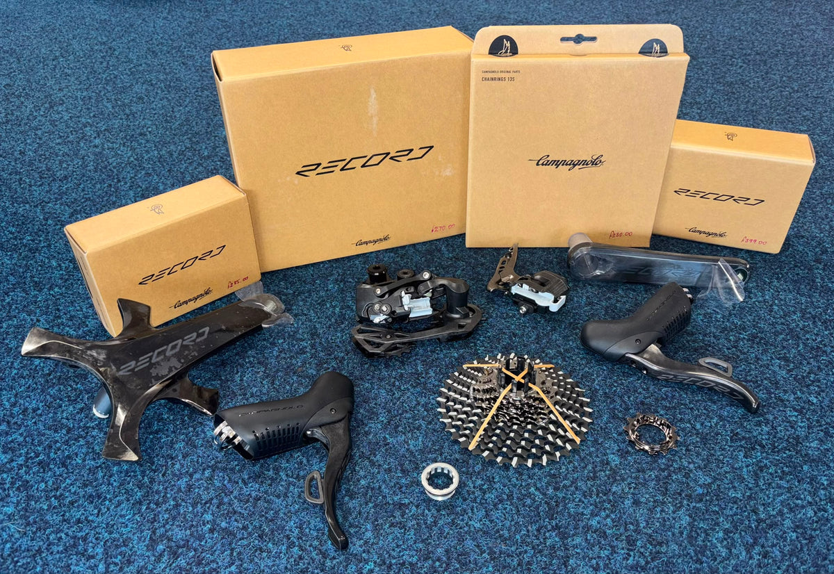 Complete Campagnolo Record 13 speed groupset laid out with original boxes