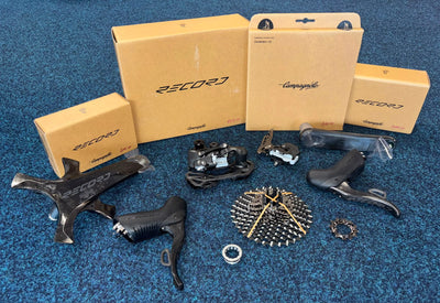 Complete Campagnolo Record 13 speed groupset laid out with original boxes